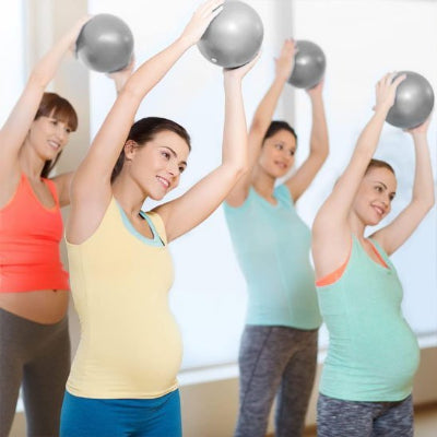 ballon pilates un groupe de femme pratique 